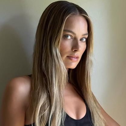 Margot Robbie attended her first a Big Bold Beautiful Journey press event in a little black Stella McCartney dress