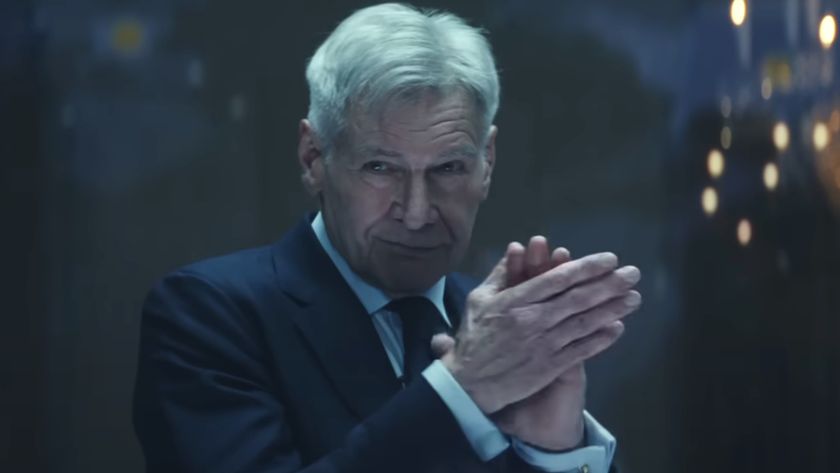 Harrison Ford claps while smiling a bit oddly in Captain America: Brave New World.