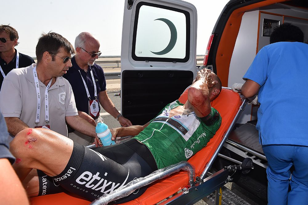 Tom Boonen leaves the race in an ambulance
