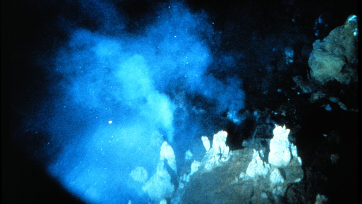 pale white rock columns seen amid burst of blue