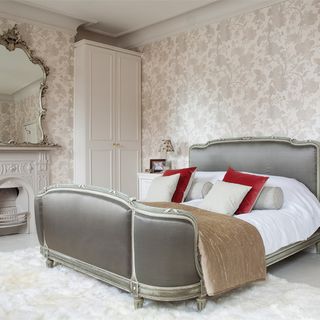 grey wallpapered bedroom
