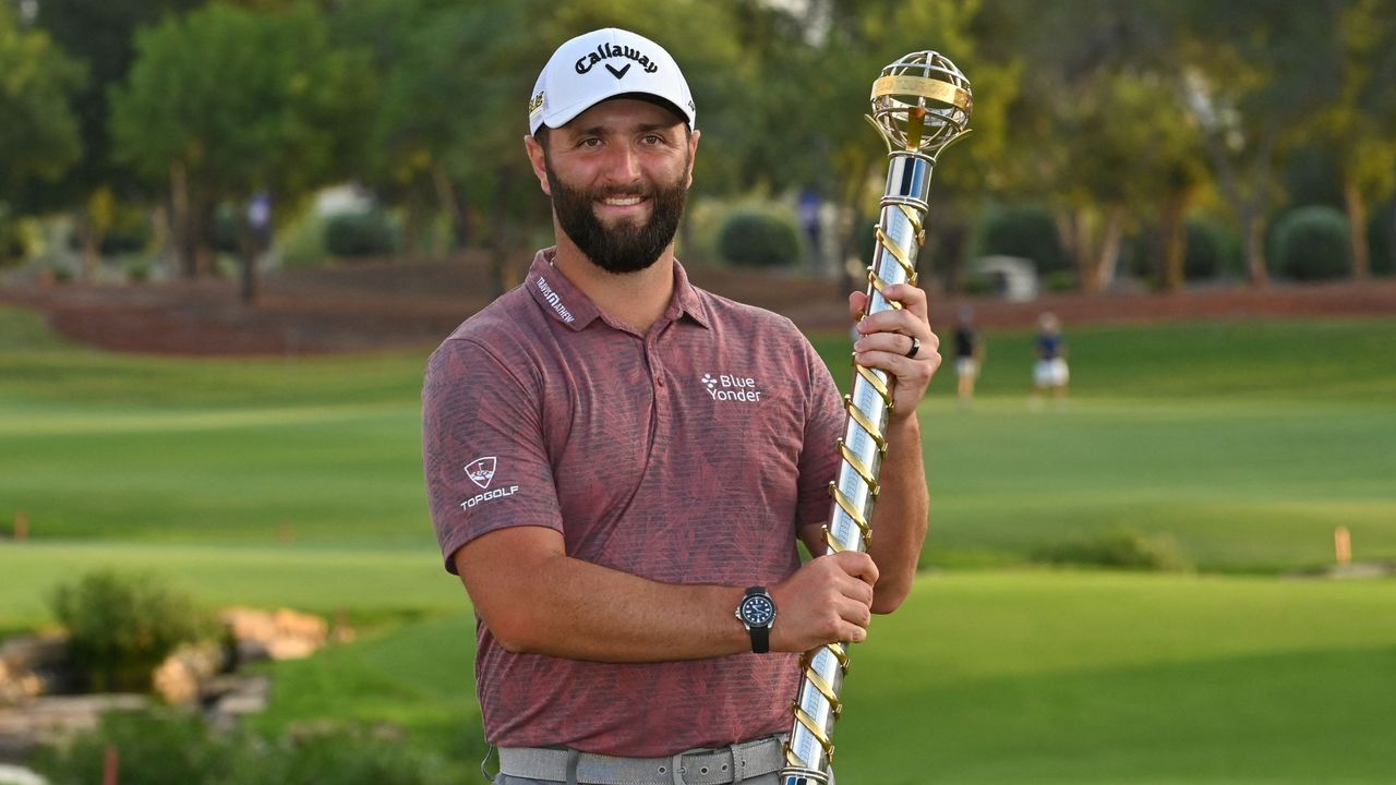 Jon Rahm with the DP World Tour Championship trophy