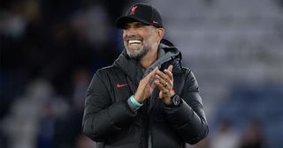 Liverpool manager Jurgen Klopp celebrates to fans following the Premier League match between Leicester City and Liverpool FC at The King Power Stadium on May 15, 2023 in Leicester, United Kingdom.