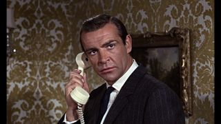 Sean Connery looking rather concerned as he takes a phone call in From Russia With Love.