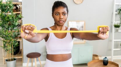 Woman doing resistance band exercise