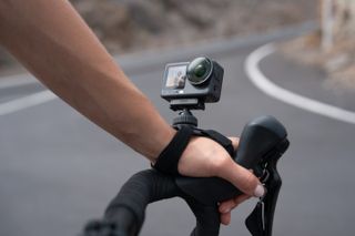 DJI Osmo Action 6 on road bike strap