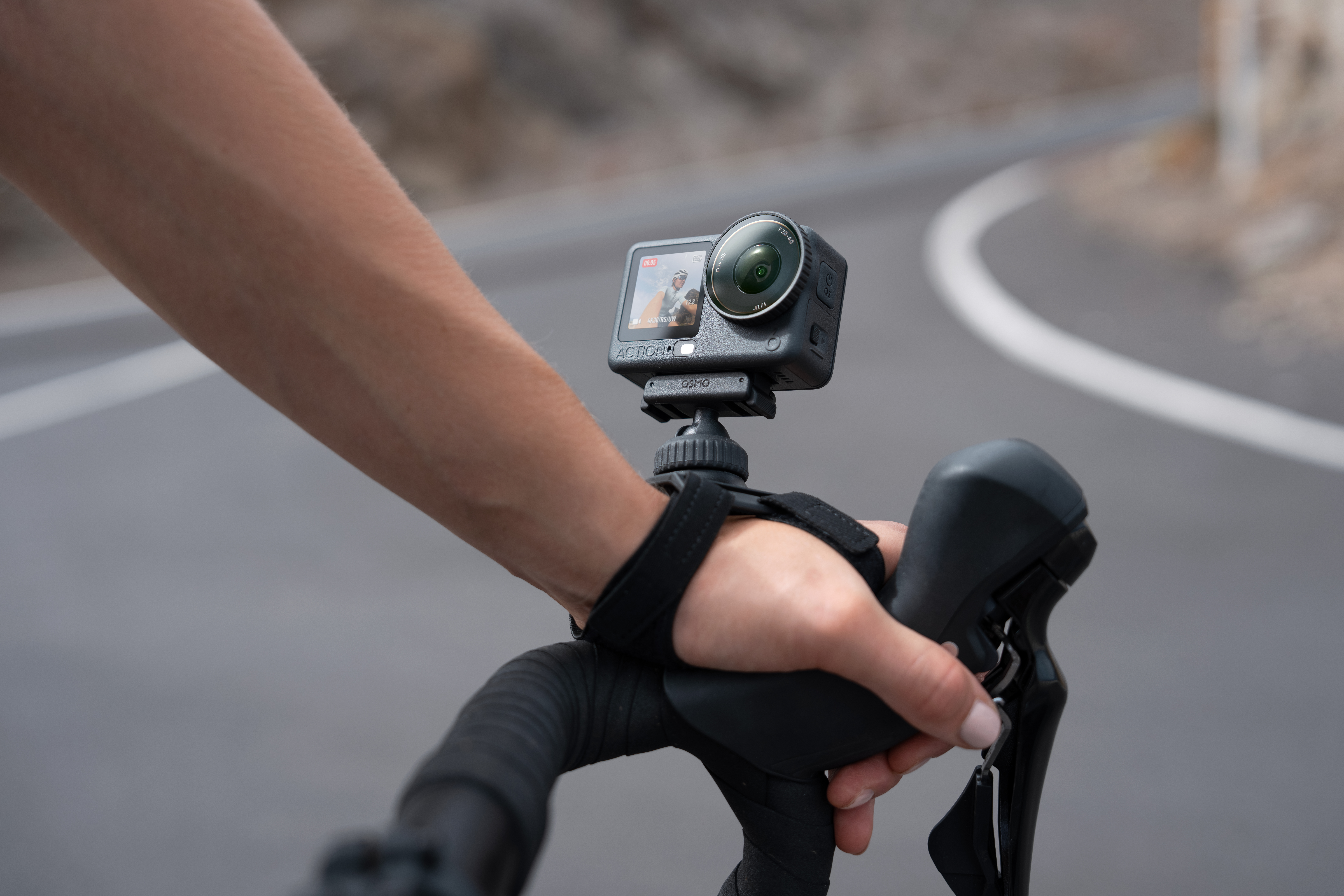 DJI Osmo Action 6 on road bike strap