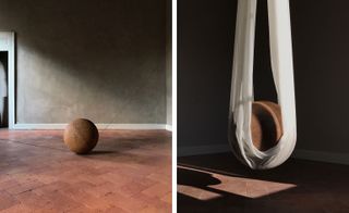 Natural silk hangs from the ceiling like a hammock, holding an acid-treated iron sphere that weighs it down into the shape of a teardrop