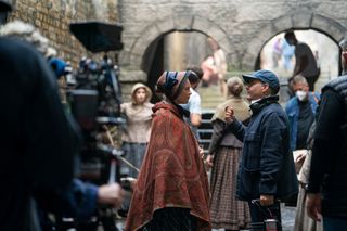 Florence Pugh taking direction while filming The Wonder.