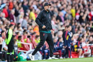 Jurgen Klopp of Liverpool celebrates after Darwin Núñez scores a goal to make it 1-1 during the Premier League match between Arsenal FC and Liverpool FC at Emirates Stadium on October 09, 2022 in London, England.