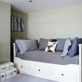 guest room daybed ideas, daybed with storage underneath, stripe mattress and pillows plain blue cushions, sage green walls