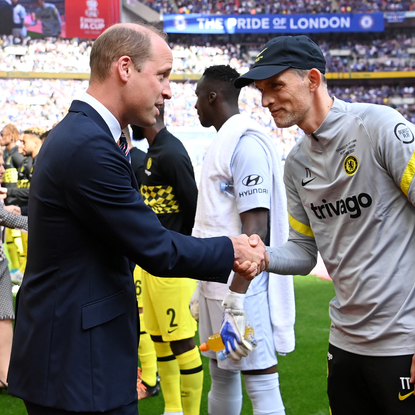 Prince William, The Duke of Cambridge greets Thomas Tuchel, Manager of Chelsea prior to The FA Cup Final match between Chelsea and Liverpool at Wembley Stadium on May 14, 2022 in London, England