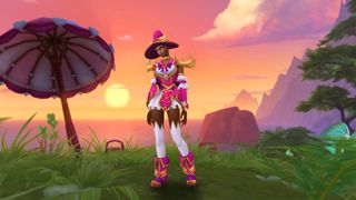World of Warcraft screenshot of a Blood Elf standing in front of a sunset wearing a pink and white outfit