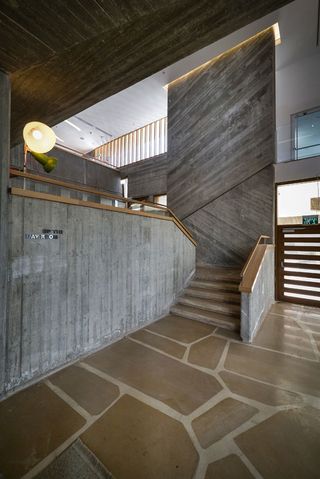 Indoor stairwell with grey walls