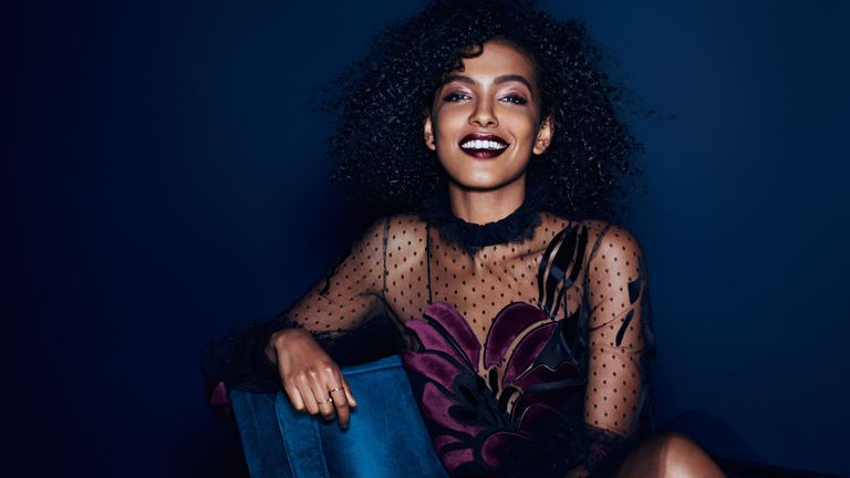 Hair, Face, Blue, Head, Beauty, Hairstyle, Fashion, Music artist, Black hair, Smile,