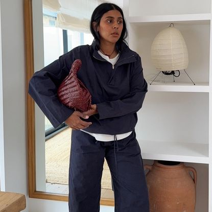 Monikh wears a technical jacket and leset kyoto pants.