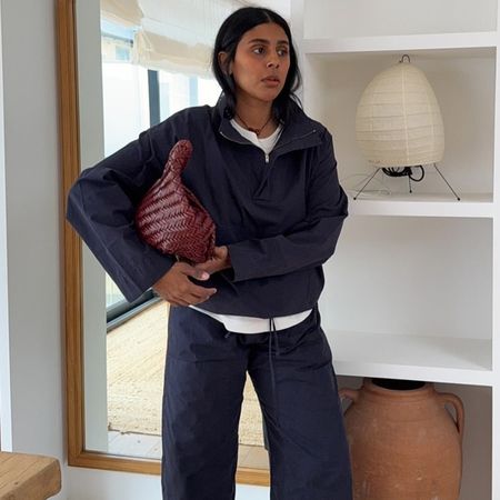 Monikh wears a technical jacket and leset kyoto pants.