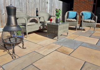 patio paved in Old Riven Autumn Gold, Bronze , Cotswold by Bradstone