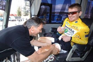 Floyd Landis gets a massage on the Phonak bus at the 2006 Paris-Nice.