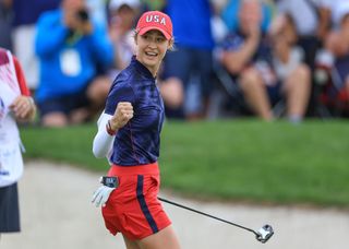 Nelly Korda fist pumps after holing a putt