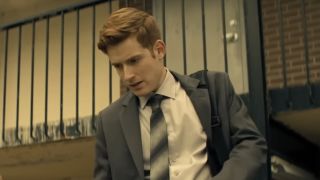 Daniel David Stewart in a suit and tie on Reacher