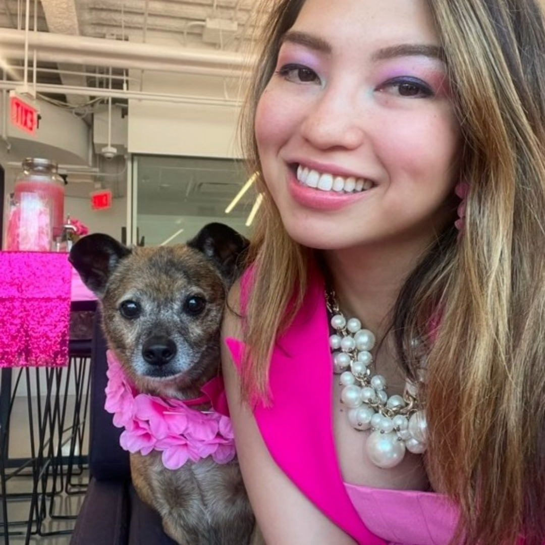 Sarah and Duke wearing matching pink accessories