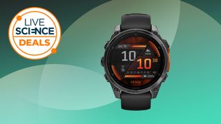 Garmin Fenix 8 on a green background