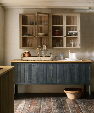 Freestanding kitchen layout ideas in a rustic wooden and dark blue scheme.