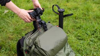 Top loading a Nikon Z 8 and Z 180-600mm into the PGYTech OnePro Focux Backpack