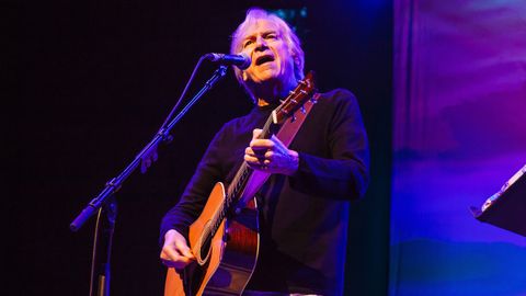 Justin Hayward live solo with blue lighting