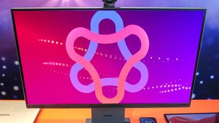 A monitor concept from Lenovo with the Qira logo on screen