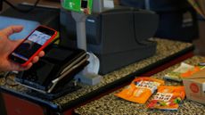 A customer uses Apple Pay at a Whole Foods in San Francisco. 
