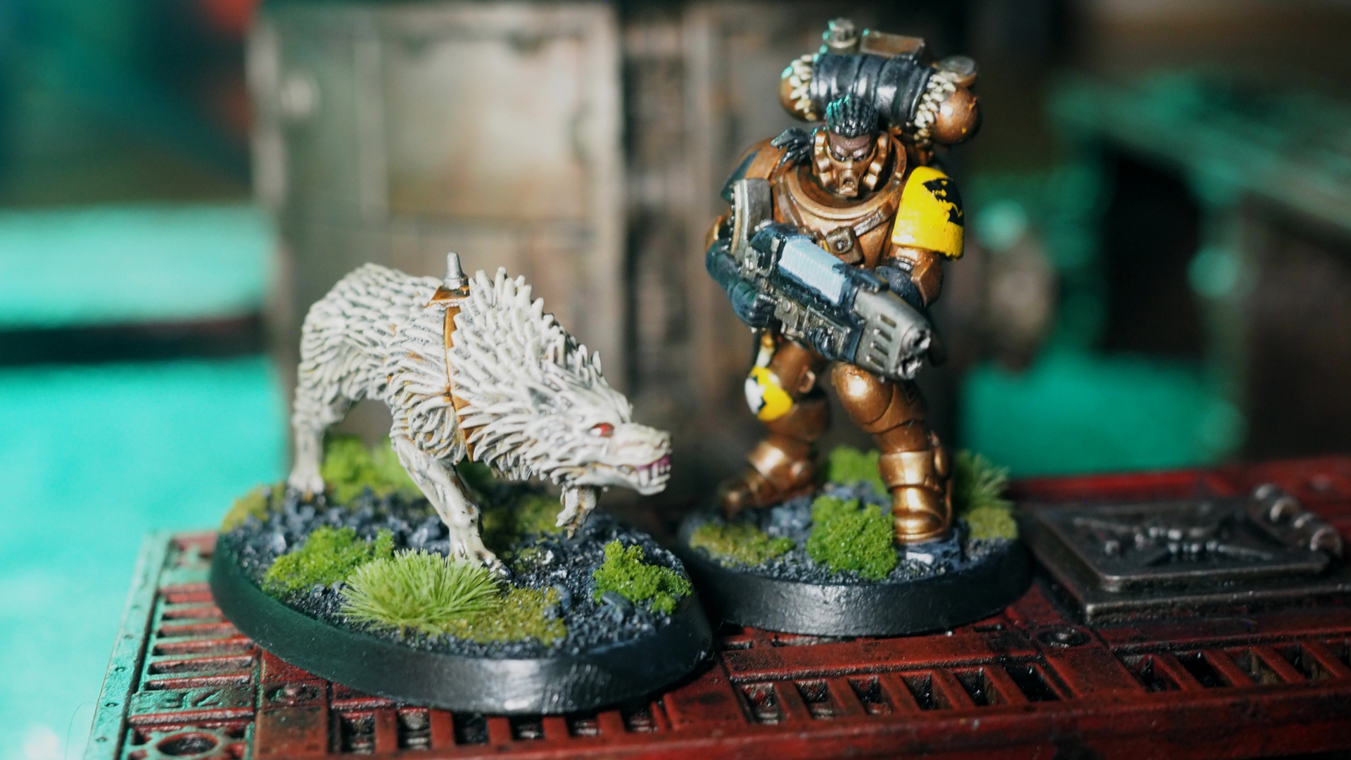 A Fenrisian Wolf and Wolf Scout on an industrial oil rig platform