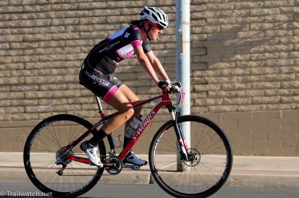 Alison Mann (Bikes for Boobs) riding through downtown