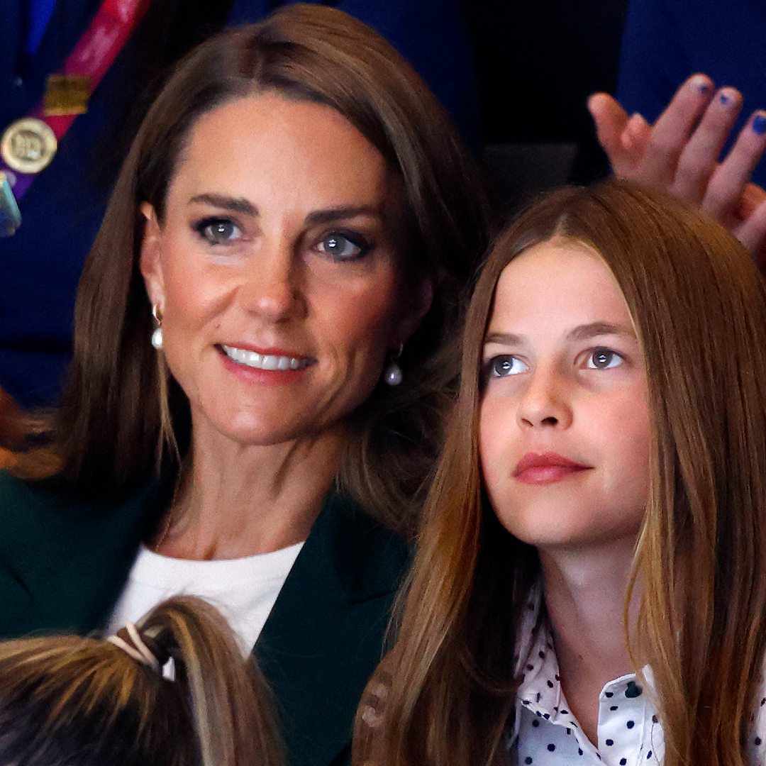 Princess Kate and Princess Charlotte sitting next to each other at the Commonwealth Games