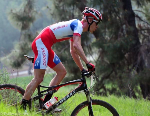 Max Plaxton (Specialized) riding in fourth position with two laps to go
