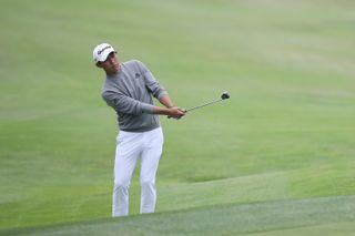 Collin Morikawa of the U.S. chips in for birdie on the 14th hole during the final round of the 2020 PGA Championship at TPC Harding Park on Aug. 9, 2020 in San Francisco, California.