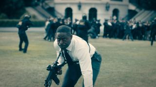 Sterling K. Brown as Xavier holding a gun in Paradise episode 7