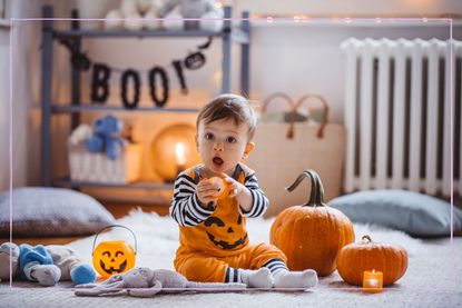 Baby wearing halloween costume
