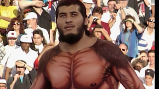 Giant Gonzalez walks to the ring in a skin suit.