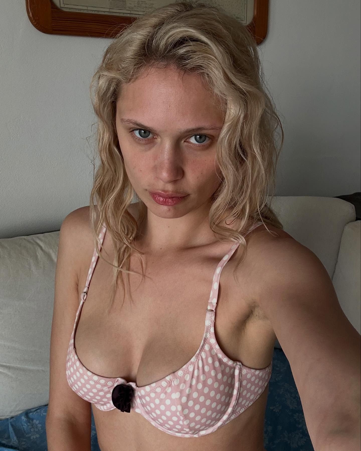 Woman wearing a Fruity Booty bikini top.