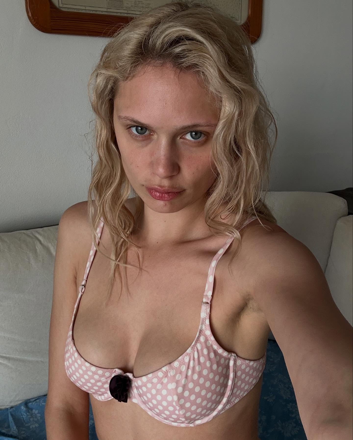 Woman wearing a Fruity Booty bikini top.