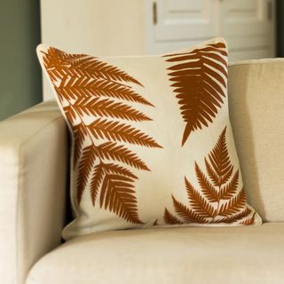 linen fern cushion on sofa