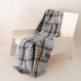 Recycled Wool Small Blanket in Mackellar Tartan draped over wooden chair