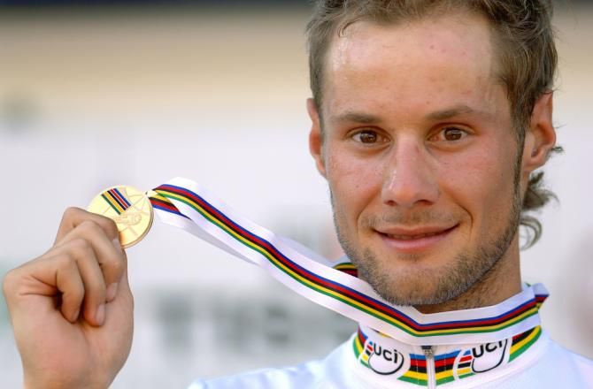 Tom Boonen (Belgium) holds his 2005 Worlds gold medal aloft