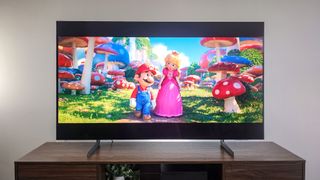 Samsung S85D OLED TV on stand in living room