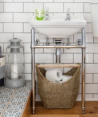 bathroom with cane basket with tissue roll