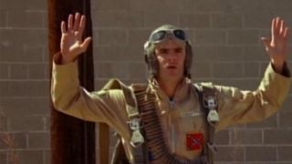 Stephen Peace in a pilot uniform in Attack Of The Killer Tomatoes II