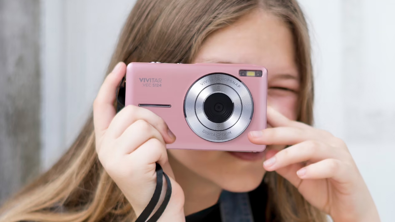 Vivitar Popsnap compact digital camera being used by a photographer