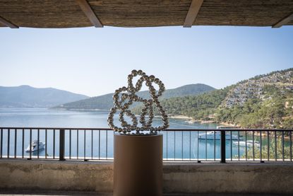 Sculpture at Bodrum Loft / Perrotin exhibition, with view of sea